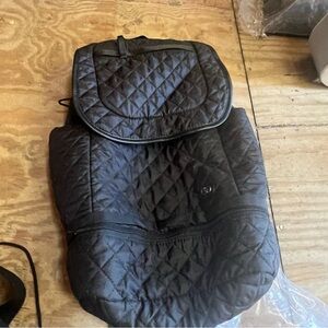 Black multi compartment back pack.